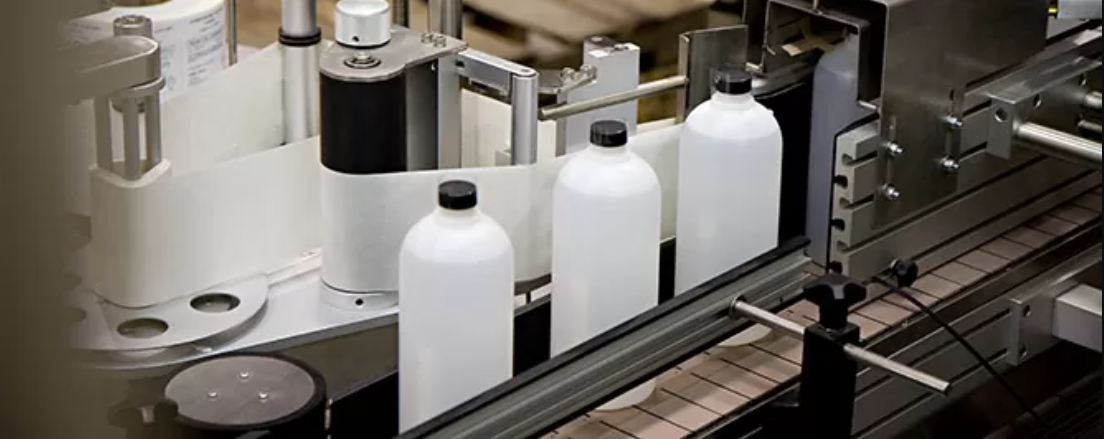 3 bottles on a factory line